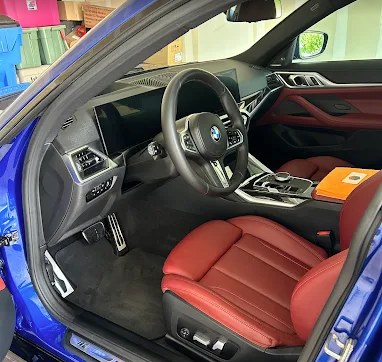 Red leather interior of a BMW M4 after a full interior detail